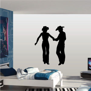 Cowboy love wall decal with two black cowboy silhouettes holding hands