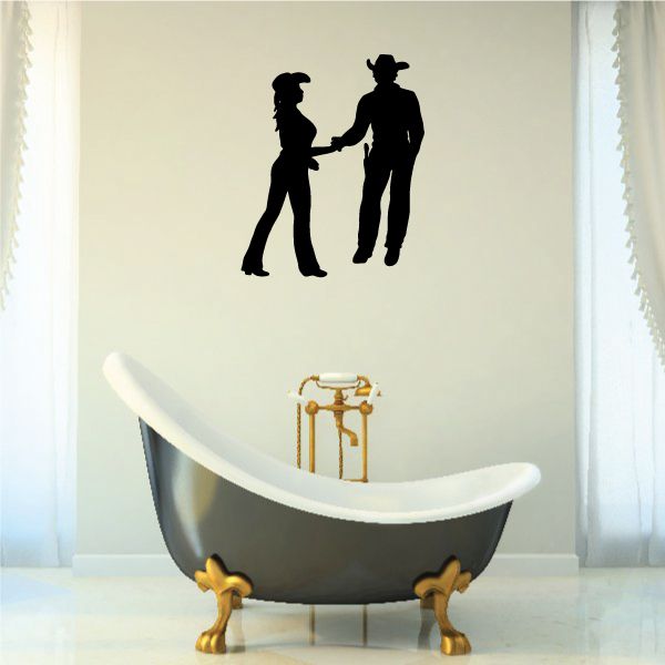 Cowboy love wall decal showing two black cowboy silhouettes holding hands