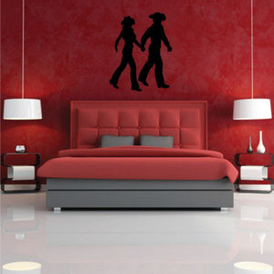 Cowboy love wall decal with black cowboy and cowgirl walking silhouettes