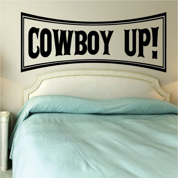 Wall quote vinyl decal: bold black “COWBOY UP!” in white-outlined frame