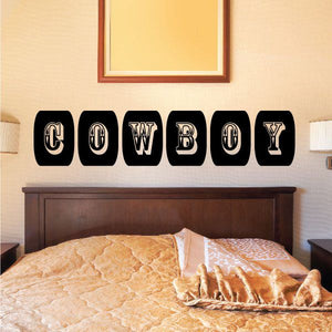 Cowboy wall quote vinyl decal with large black COWBOY letters