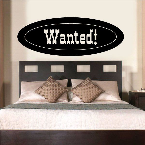Wanted! black oval vinyl wall decal with white outline lettering