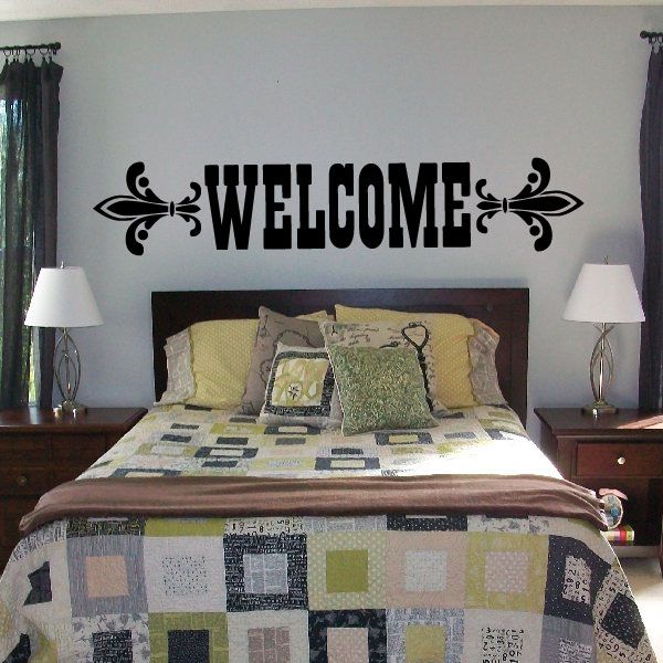Welcome wall decal with bold 'WELCOME' lettering and decorative scroll accents
