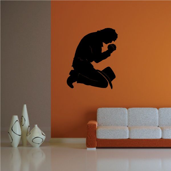 Praying cowboy wall decal with hat, shown in black silhouette