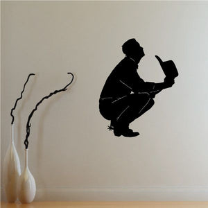 Cowboy praying with spurs wall decal, black silhouette