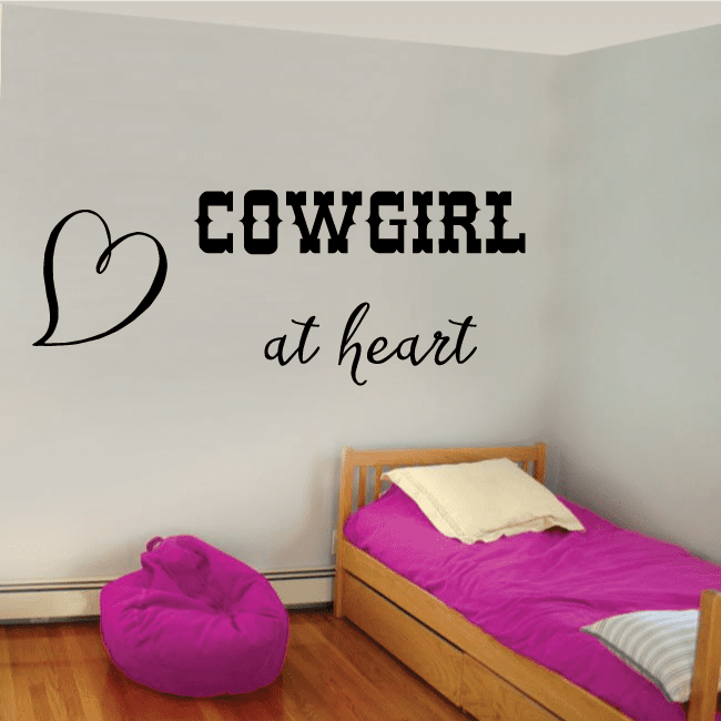 Heart-themed wall decal with 'COWGIRL at heart' lettering and heart outline