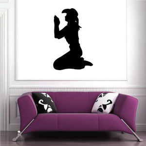 Prayer wall decal of a black cowgirl silhouette kneeling with hands together