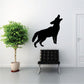 Coyote howling wall decal, black standing silhouette with raised tail and ears.