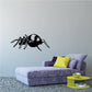 Crawling spider wall decal with black woven web design