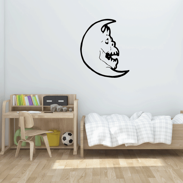 Moon decal with black outline of a creature face inside the crescent