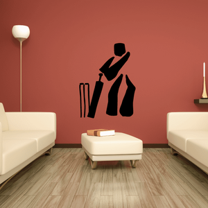 Cricket batter silhouette wall decal holding a bat