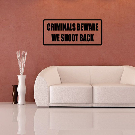 Image of Criminals beware we shoot back Decal