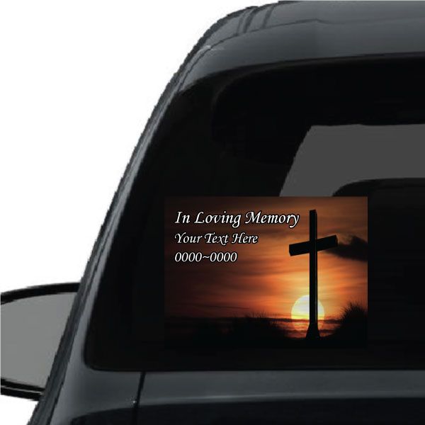 Rectangle memorial sticker with 'In Loving Memory' text, sunset scene, and black cross