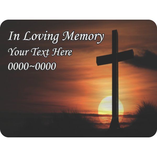 Rounded rectangle memorial sticker with cross silhouette over orange sunset and custom text