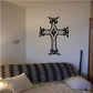 Black ornamental cross wall decal with symmetrical butterfly-like details