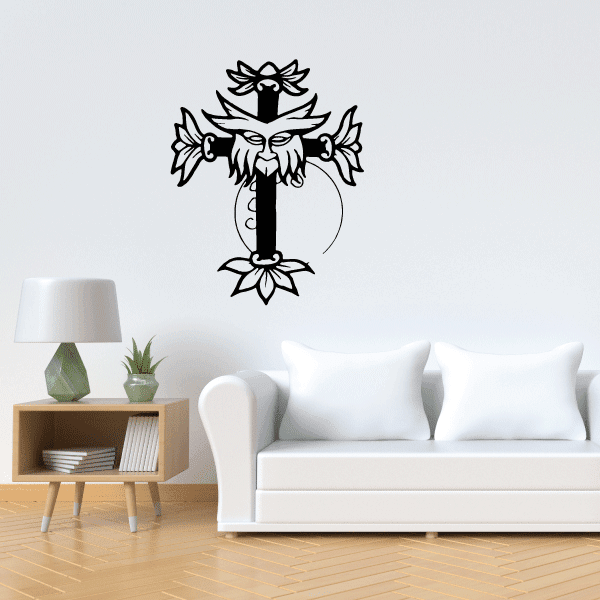 Black cross decal with forest sprite mask, wings, and floral details