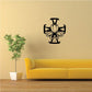 Black cross with lotus flower decal, ornate swirls and candle-like center