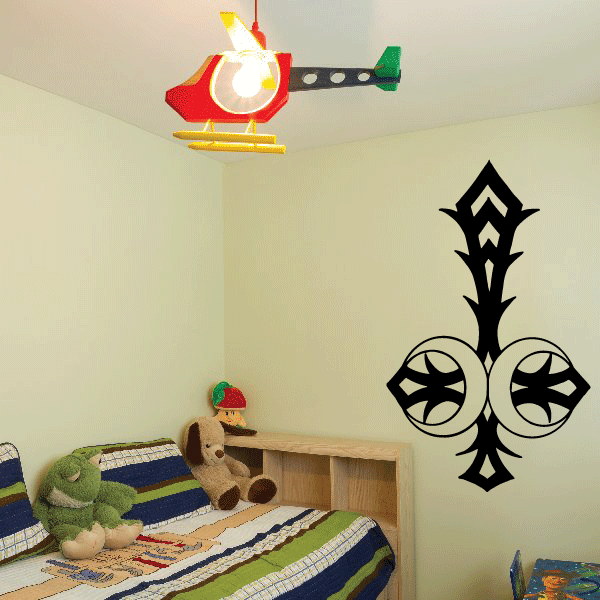 Black cross decal with two moon-like symbols