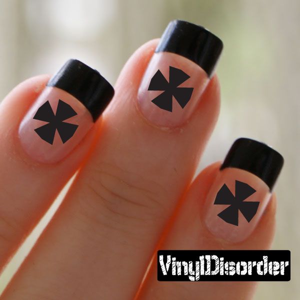 Fingernail art stickers with black cross symbols on clear nails, for nail decals