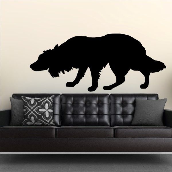 Crouching hunting dog vinyl decal, black dog silhouette with tail and paws