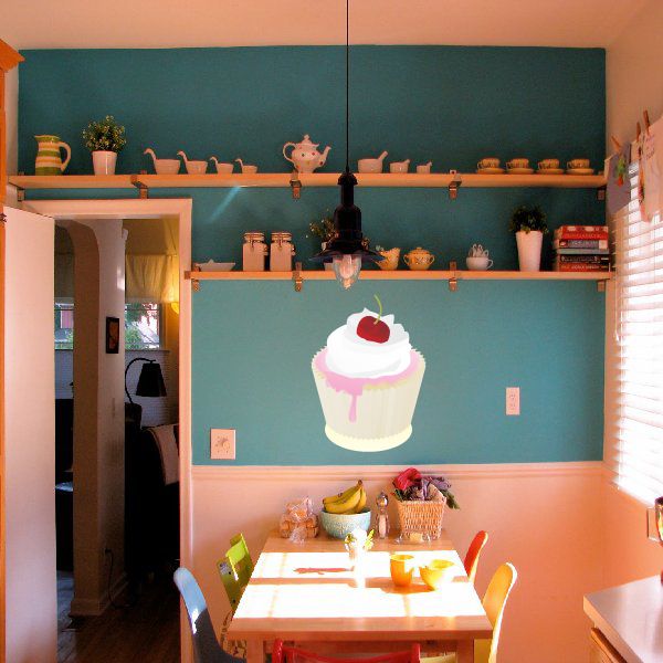 Cupcake sticker decoration with white frosting and a red cherry