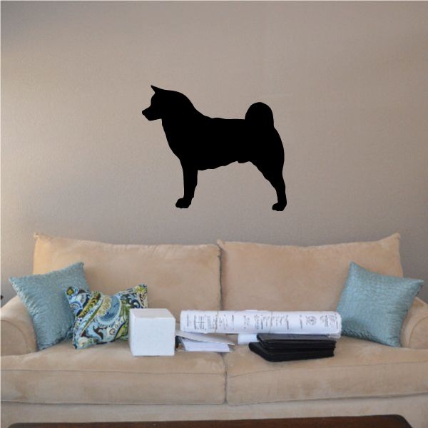 Curious Akita decal featuring a black dog silhouette
