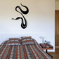 Curious snake decal with a black coiled silhouette