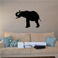 Curled-back elephant wall decal with dark silhouette, trunk curled upward
