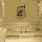 Curled boa constrictor wall decal, cartoon black and tan with spots and coiled tail