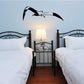 Black seagull wing curling decal with arched flight silhouette