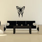 Tribal butterfly decal, black with curled decorative lines and tribal detailing