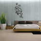 Curly vine frog wall decal with black line art