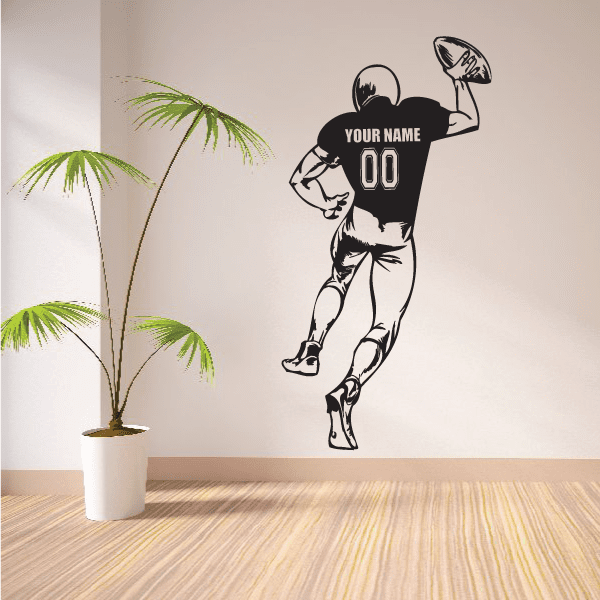 Football quarterback full-body wall decal, black silhouette with YOUR NAME and number 00