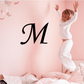 Custom letter decal with black cursive M