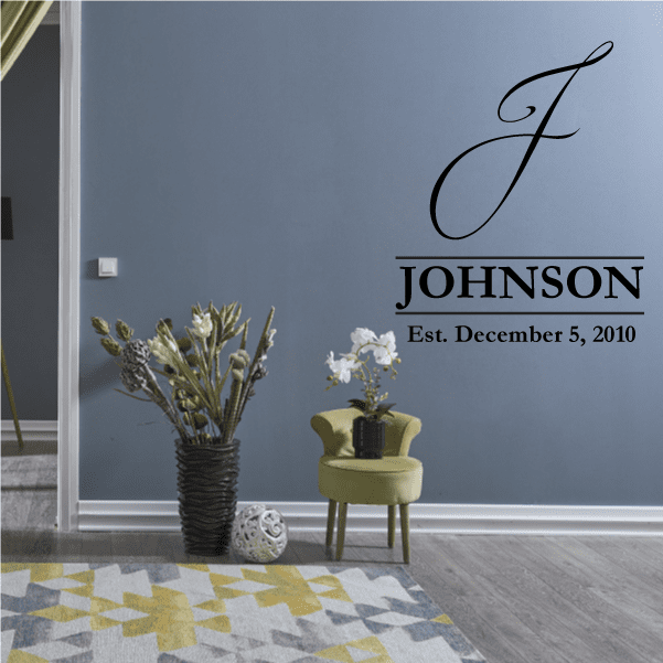 Wall decal with black script monogram, name JOHNSON, and date "December 5, 2010"
