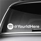 Custom Spotify die cut decal with Spotify icon and @YourIdHere text on car window