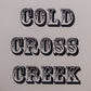 Three line text decal with bold outlined letter design in dark and light accents