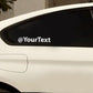 Vinyl decal with @YourText on a car panel