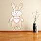 Cute bunny sticker with large heart on its belly, off-white cartoon style