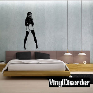 Futuristic babe vinyl wall decal with standing dark silhouette and boots