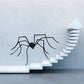 Black spider wall decal with long legs and detailed body