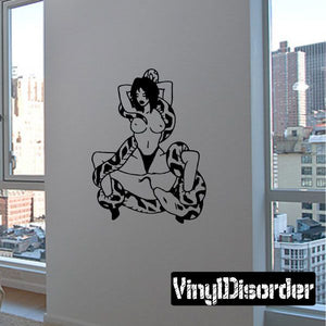 Snake decal with black line-art woman and coiled snake on light background