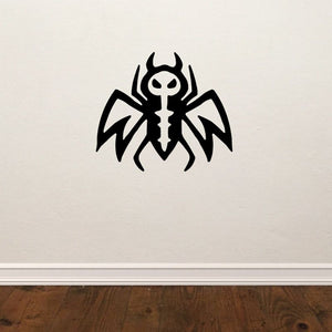 Black stylized bug decal with sharp horns and wings, evil emblem design
