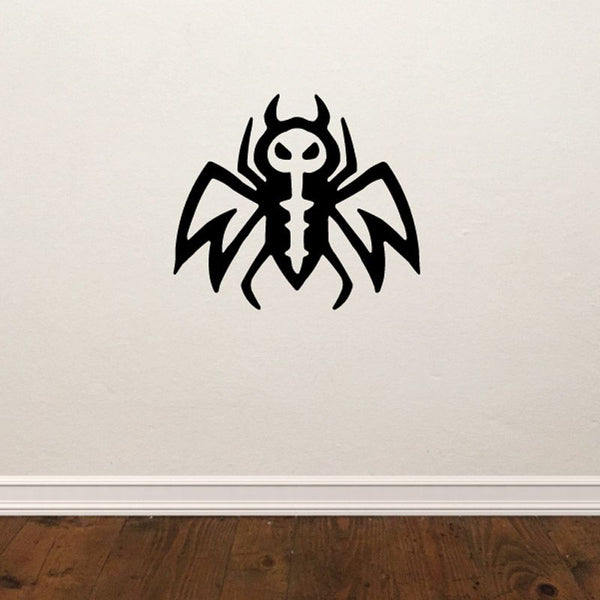 Black stylized bug decal with sharp horns and wings, evil emblem design