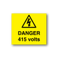 Yellow warning sticker with black triangle icon and text DANGER 415 volts