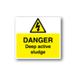 Danger warning sticker with yellow triangle and 'Deep active sludge' text