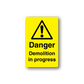 Yellow danger demolition in progress sticker with warning triangle