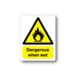 Danger when wet sticker with yellow warning triangle and "Dangerous when wet" text