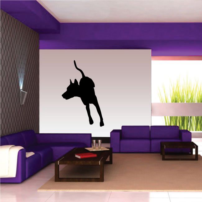 Black darting Doberman Pinscher silhouette wall decal