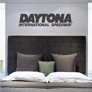 Daytona International Speedway wall decal with bold black logo text.